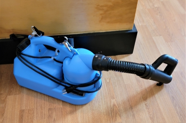 blue disinfectant fogger applicator