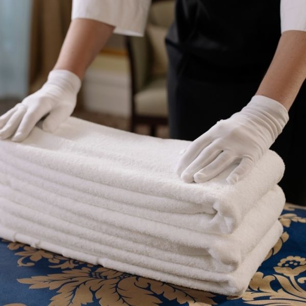 Maid Folding Towels