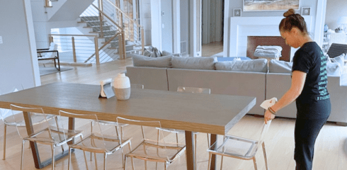 Cs Website Employee arranging dining chair
